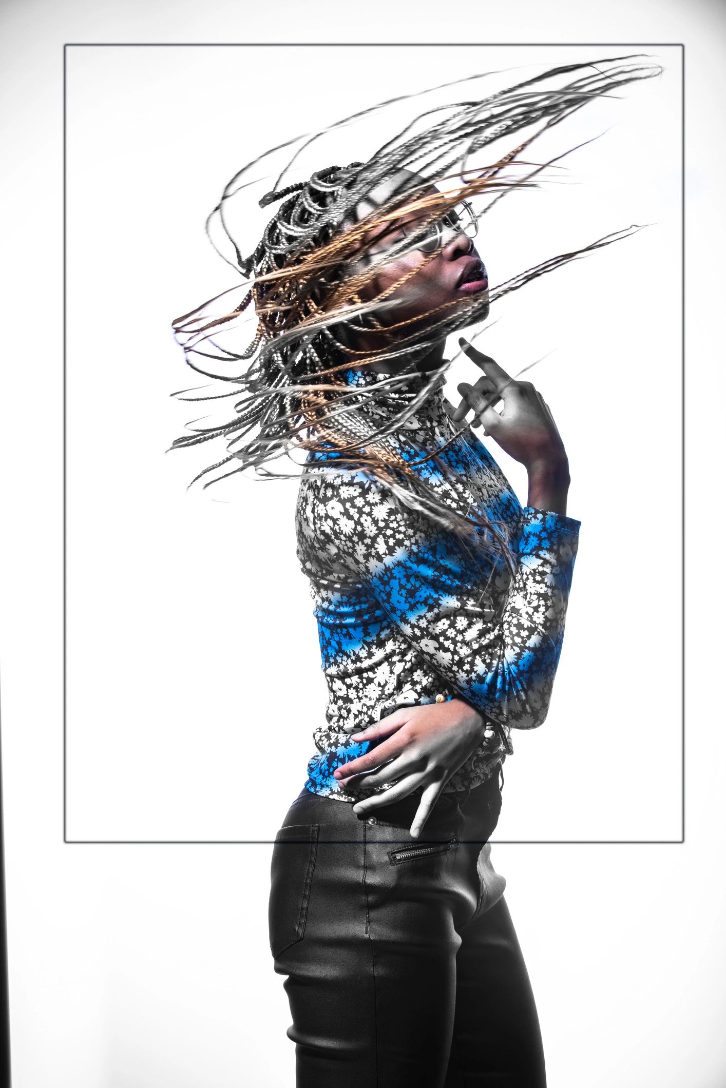 Editorial fashion portrait with dramatic movement